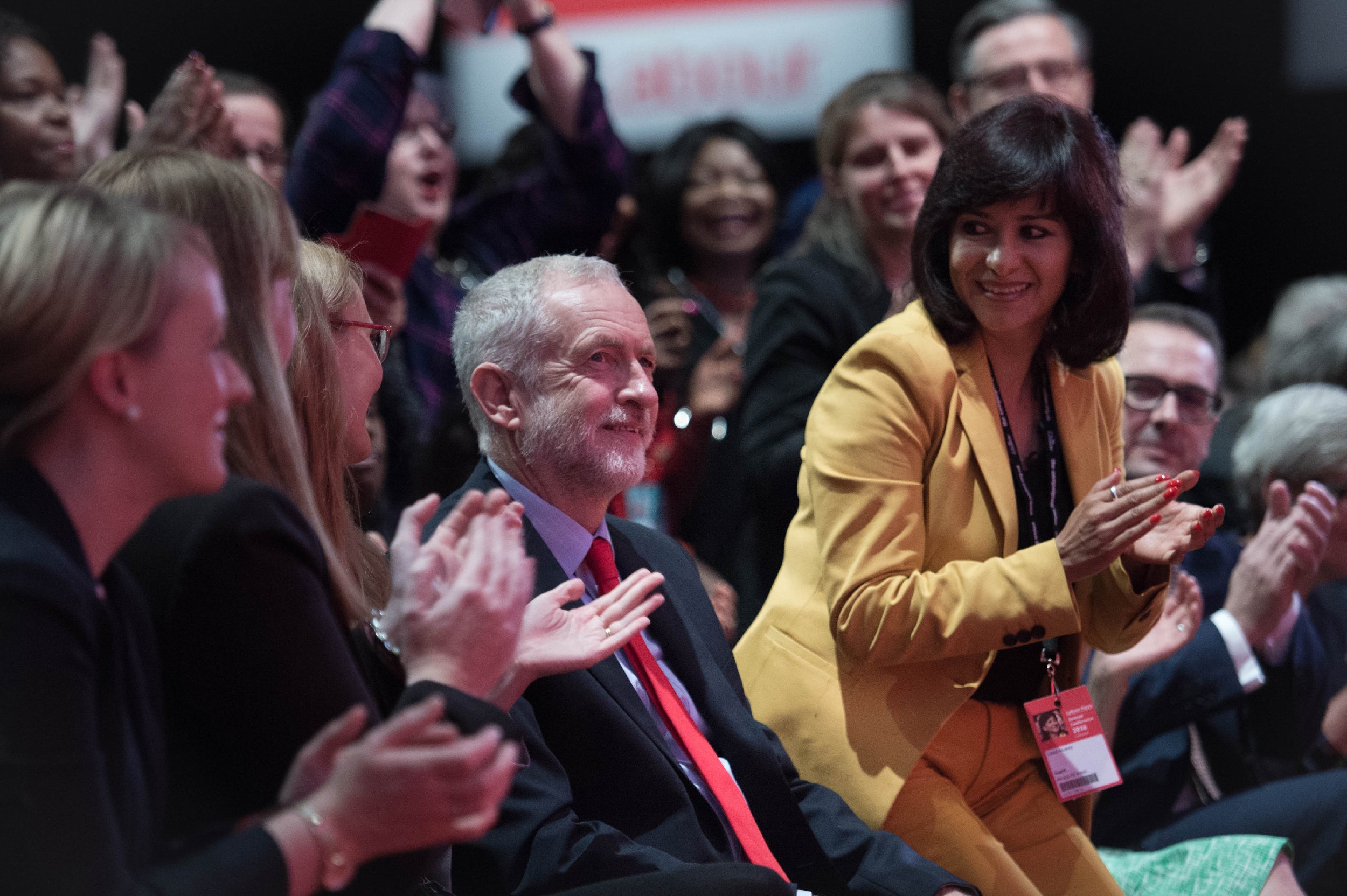 Jeremy Corbyn’s allies applaud him as he is re-elected leader but divisions remain