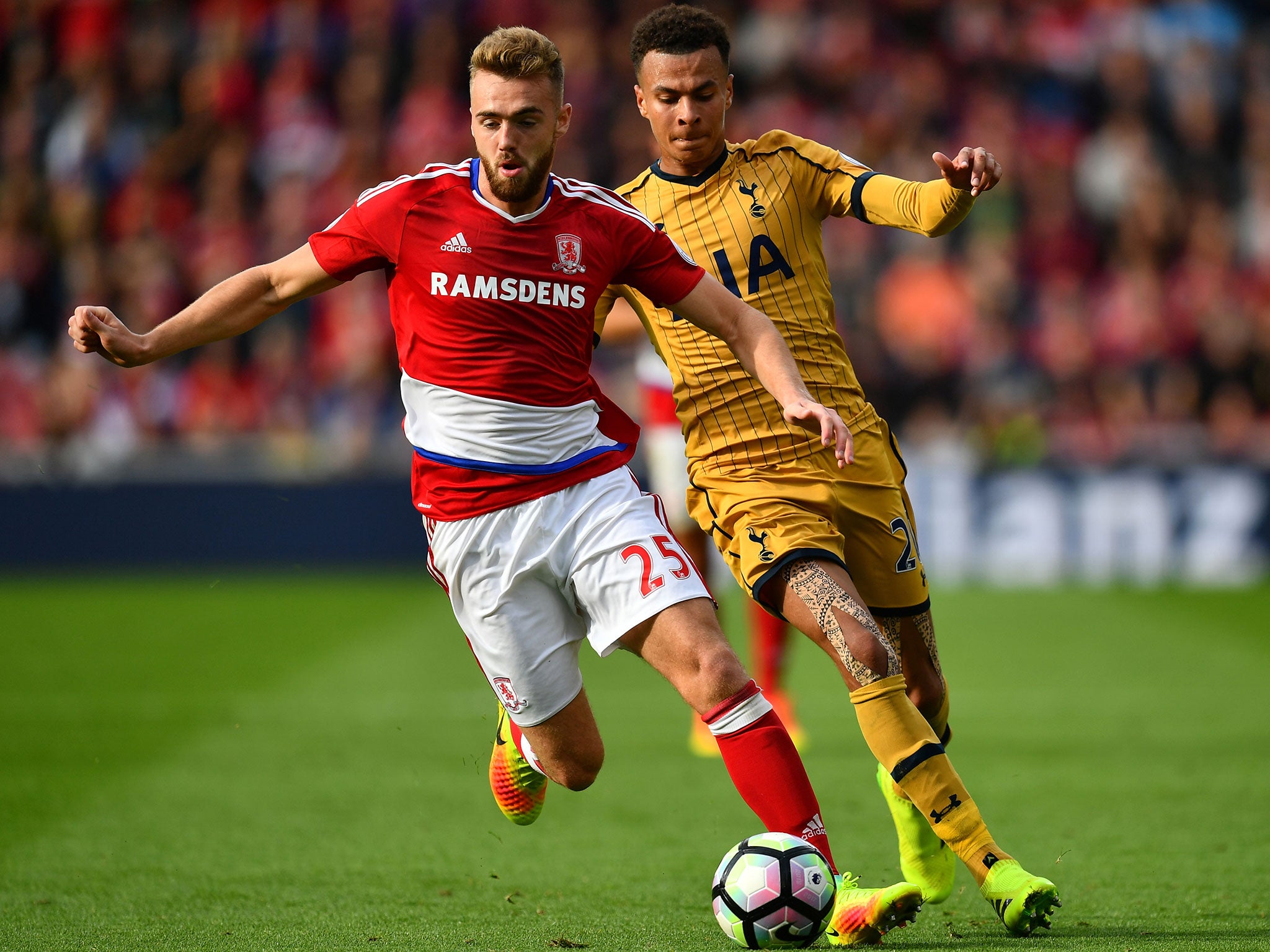 Dele Alli chases down Calum Chambers