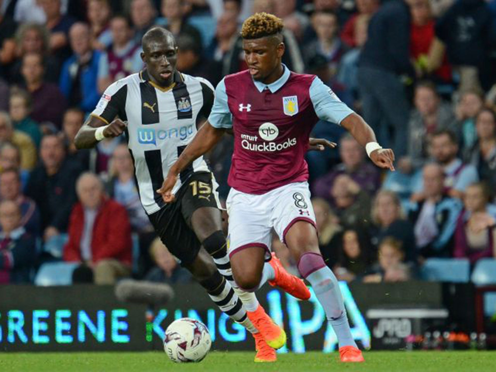 Diame and Tshibola battle for the ball
