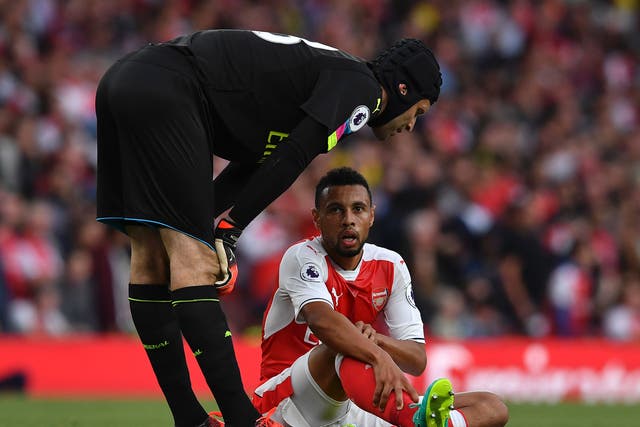 Francis Coquelin suffered a knee injury in Arsenal's 3-0 win over Chelsea