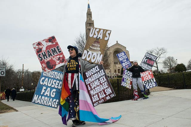 <p>Picture: Members of the Westboro Baptist Church demonstrate outside the Basilica of the National Shrine of the Immaculate Conception before the funeral service for Justice Antonin Scalia</p>