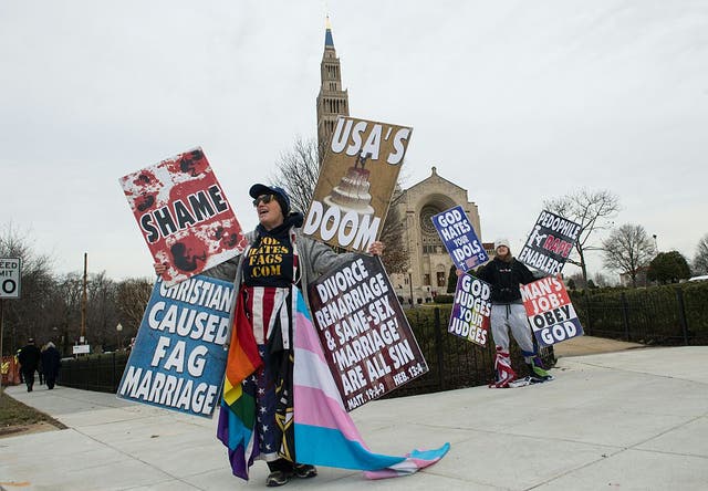 <p>Picture: Members of the Westboro Baptist Church demonstrate outside the Basilica of the National Shrine of the Immaculate Conception before the funeral service for Justice Antonin Scalia</p>