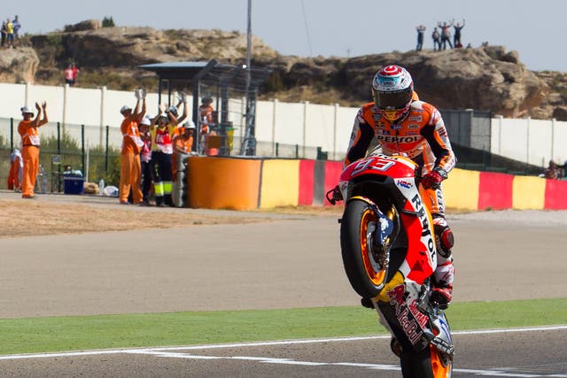 Marc Marquez wheelies over the finish line in Aragon to won the Spanish Grand Prix
