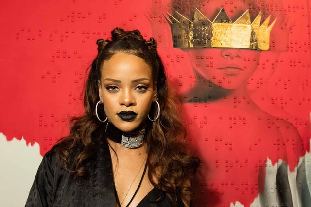 Rihanna wearing an oversized choker during her album artwork reveal earlier this year
