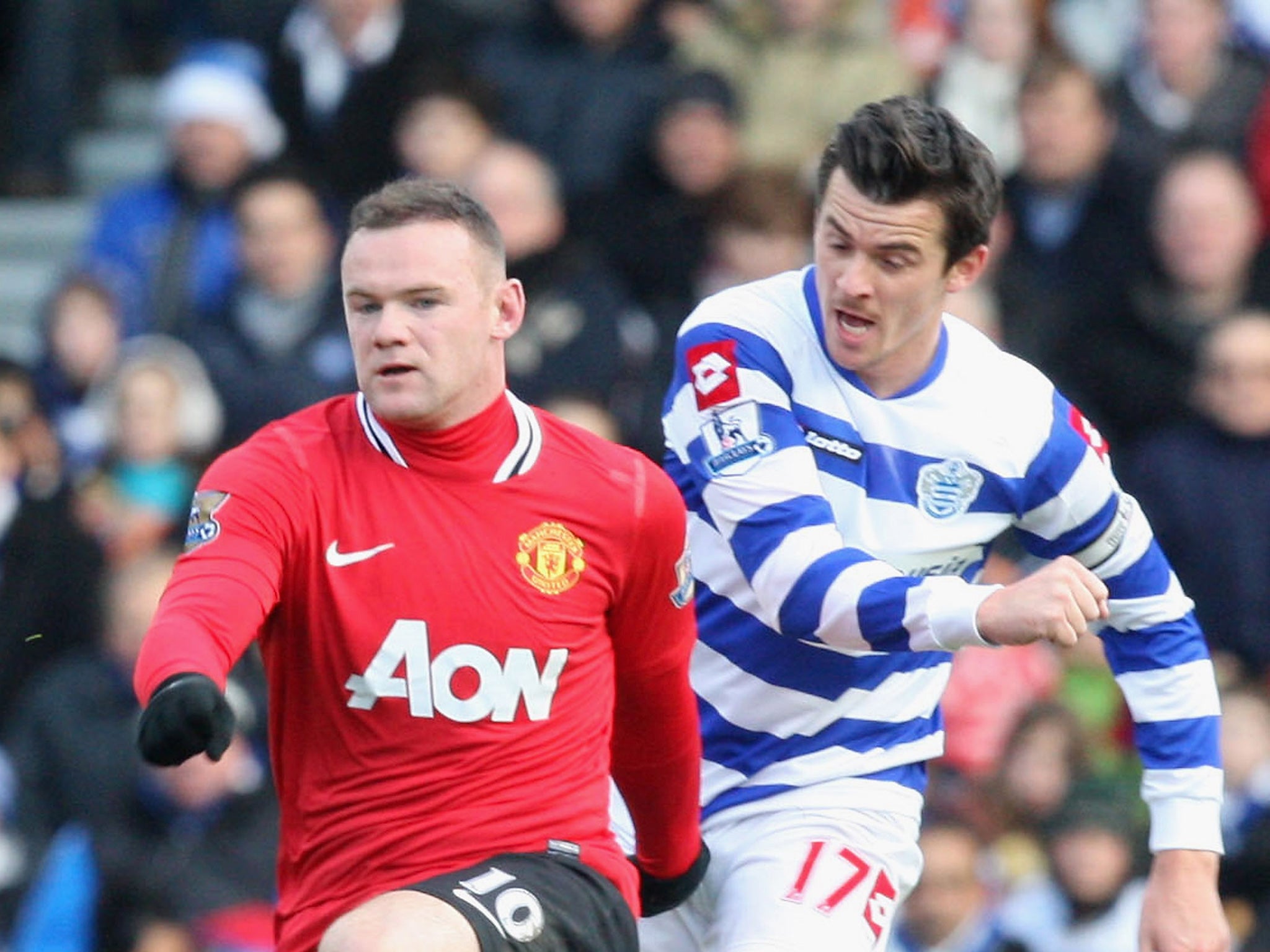 Barton in action against United while playing for Queens Park Rangers