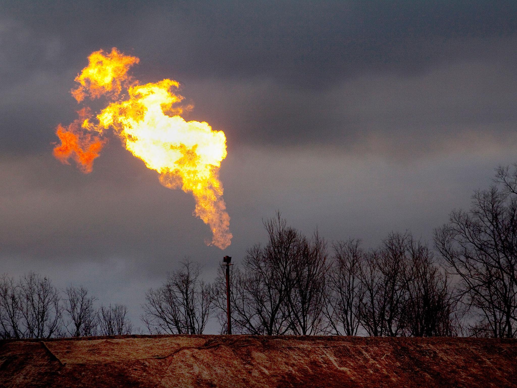 A gas flare burns at a fracking site in rural Pennsylvania