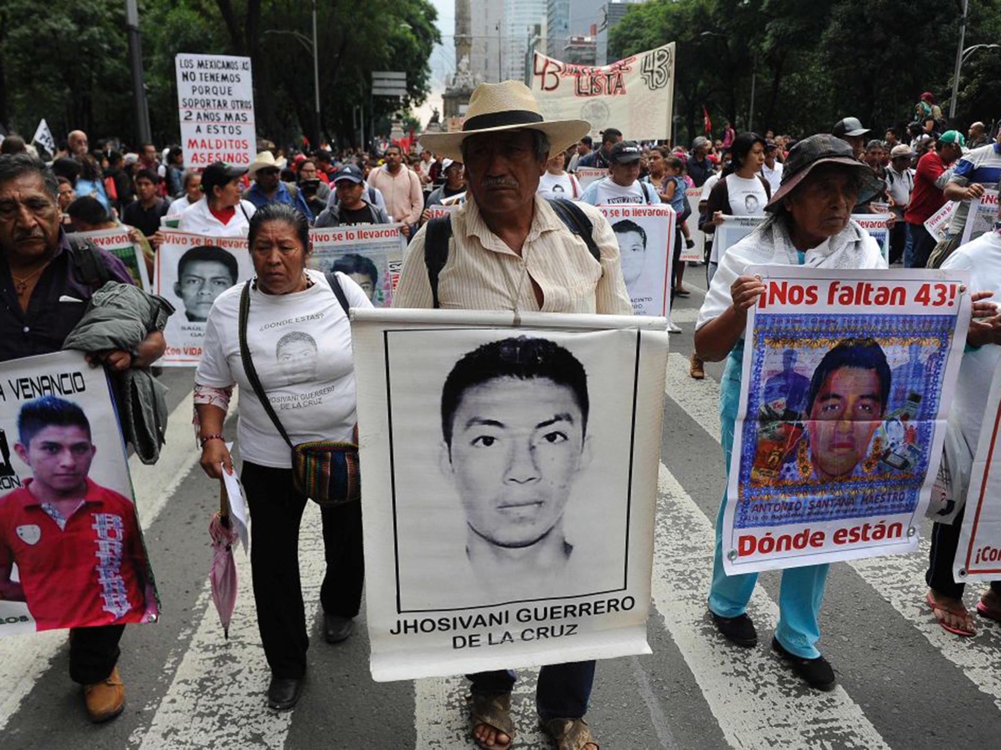 Friends and relatives of the 43 missing students from Ayotzinapa, in Mexico City 2016