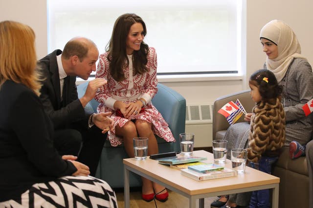 Duke and Duchess of Cambridge, with Syrian refugees Yosra Alamahameed and her daughter, Reemus, during their visit to the Immigrant Services Society of British Columbia New Welcome Centre