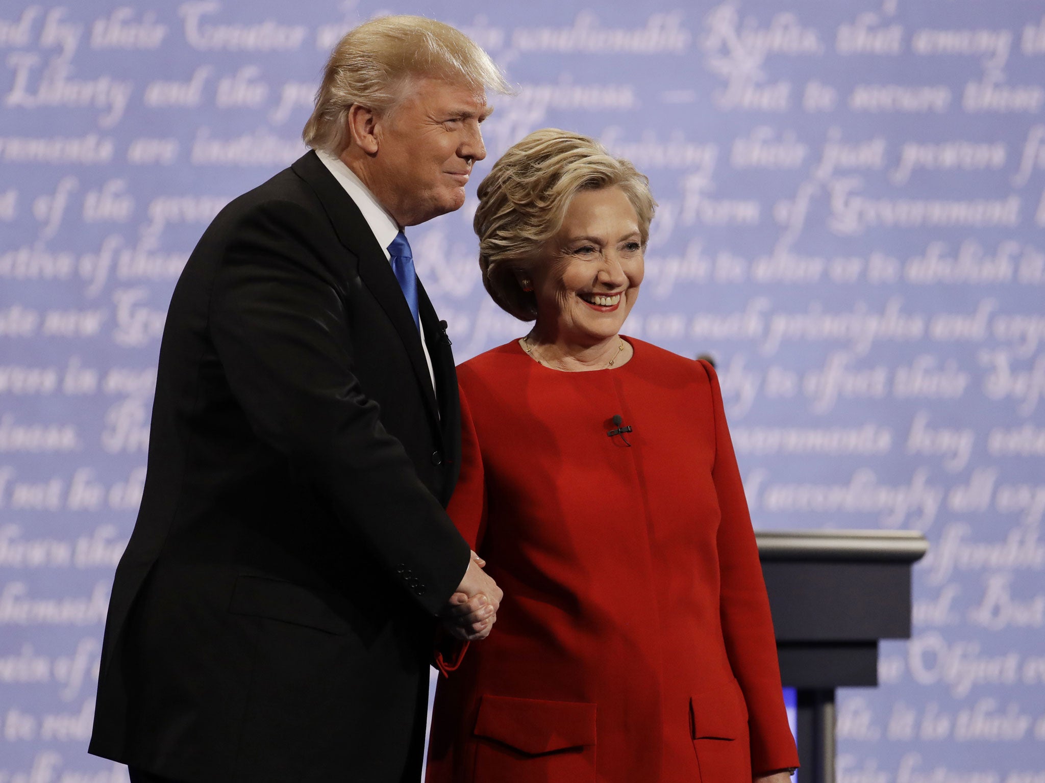 Democratic presidential nominee Hillary Clinton shakes hands with Republican presidential nominee Donald Trump during the presidential debate at Hofstra University in Hempstead, N.Y., Monday, Sept. 26, 2016.