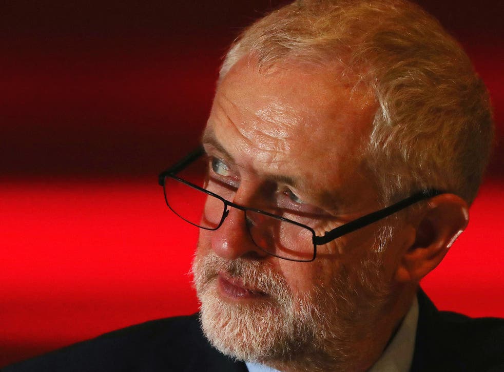 Jeremy Corbyn listens to a speaker on the third day of the Labour Party conference
