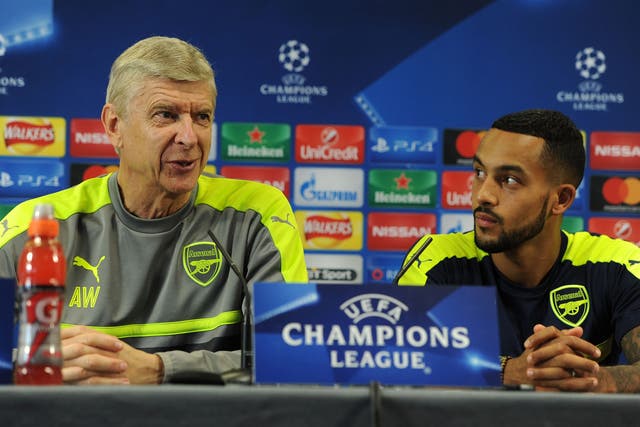 Wenger and Walcott taking questions at Tuesday's press conference