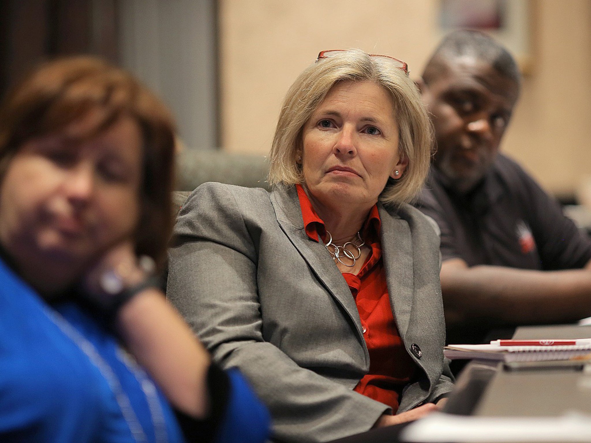 Undecided voters in the presidential election, including from left Cindy Adair, Amy Bridges and the Rev. Kelly Andrews, watch the presidential debate as part of a focus group at a hotel in Cary, N.C., on Monday