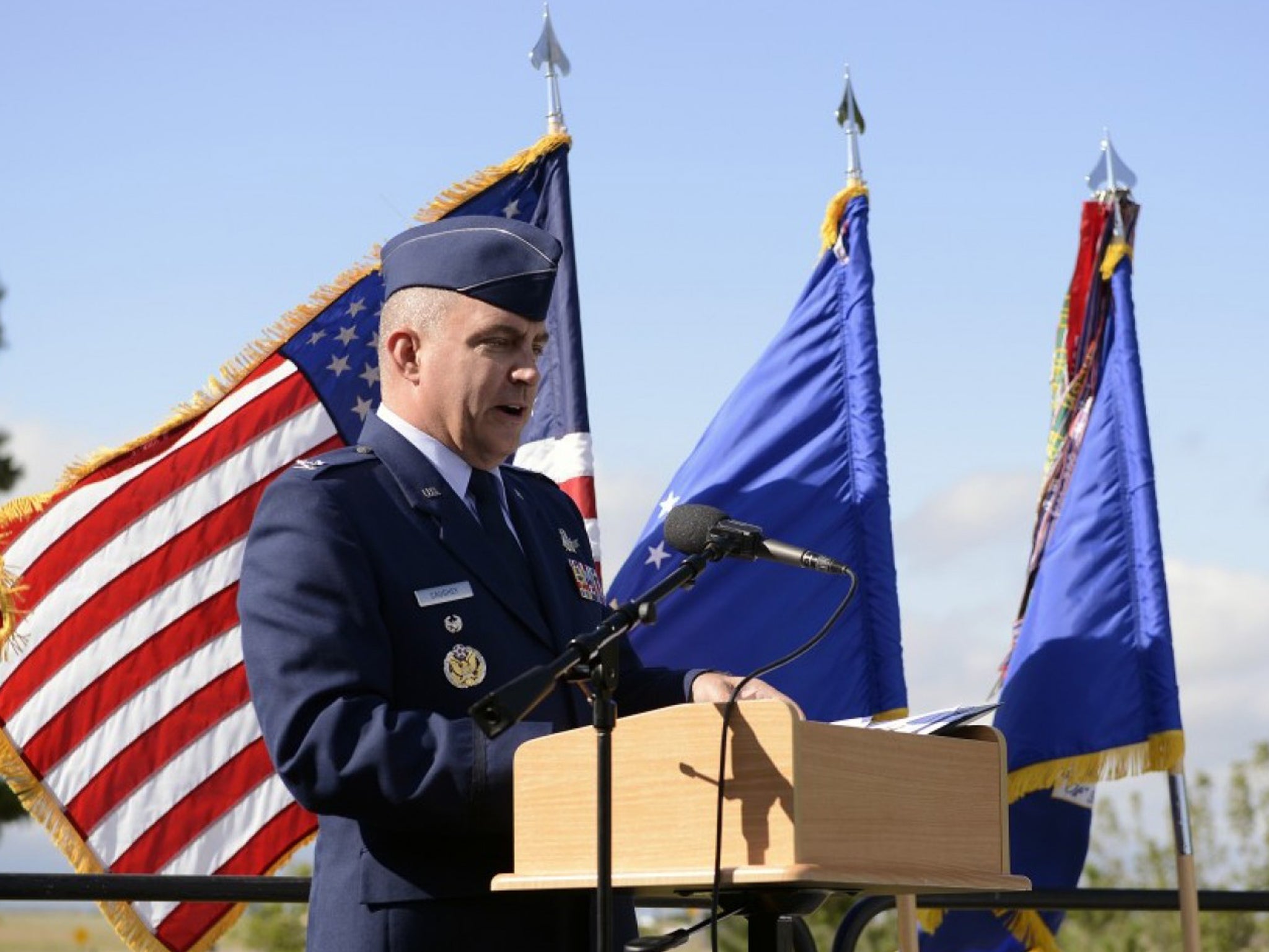 Air Force Col. Eugene Marcus Caughey, formerly vice commander of the 50th Space Wing, was found dead at his Colorado Springs home Sunday, a few weeks before he was to be court-martialed on sexual-assault charges. In this 2014 photo, Caughey speaks at a ceremony at Schriever Air Force Base marking the anniversary of the attack on the Pentagon on Sept. 11, 2001