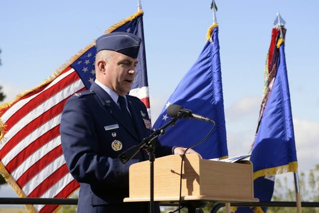 Air Force Col. Eugene Marcus Caughey, formerly vice commander of the 50th Space Wing, was found dead at his Colorado Springs home Sunday, a few weeks before he was to be court-martialed on sexual-assault charges. In this 2014 photo, Caughey speaks at a ceremony at Schriever Air Force Base marking the anniversary of the attack on the Pentagon on Sept. 11, 2001