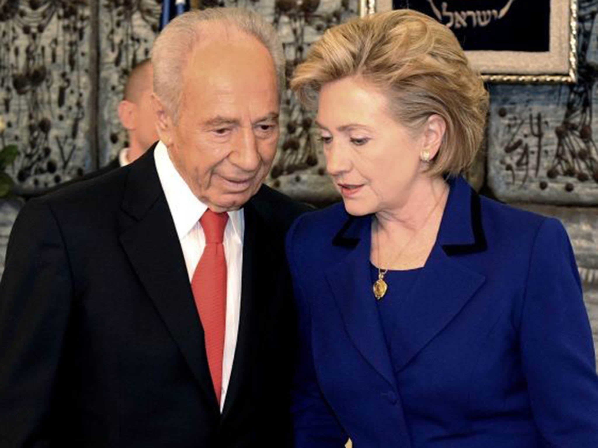 Former Israel President Shimon Peres, who died today, in a conference with then US Secretary of State Hilary Clinton in Israel in 2009