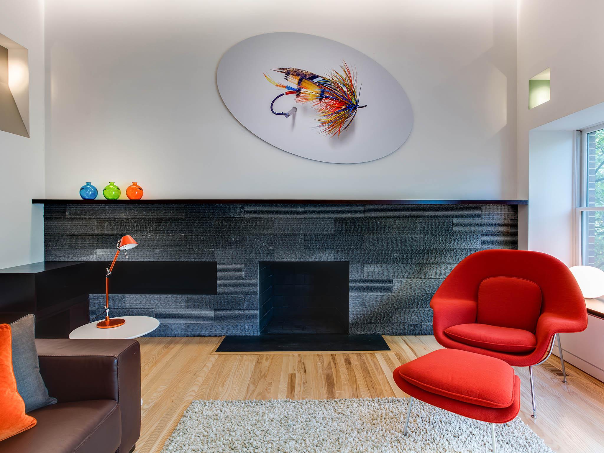 Janet Berls' Washington, DC, living room is designed for reading and hosting book clubs. It has a Saarinen 'womb chair' and lots of light