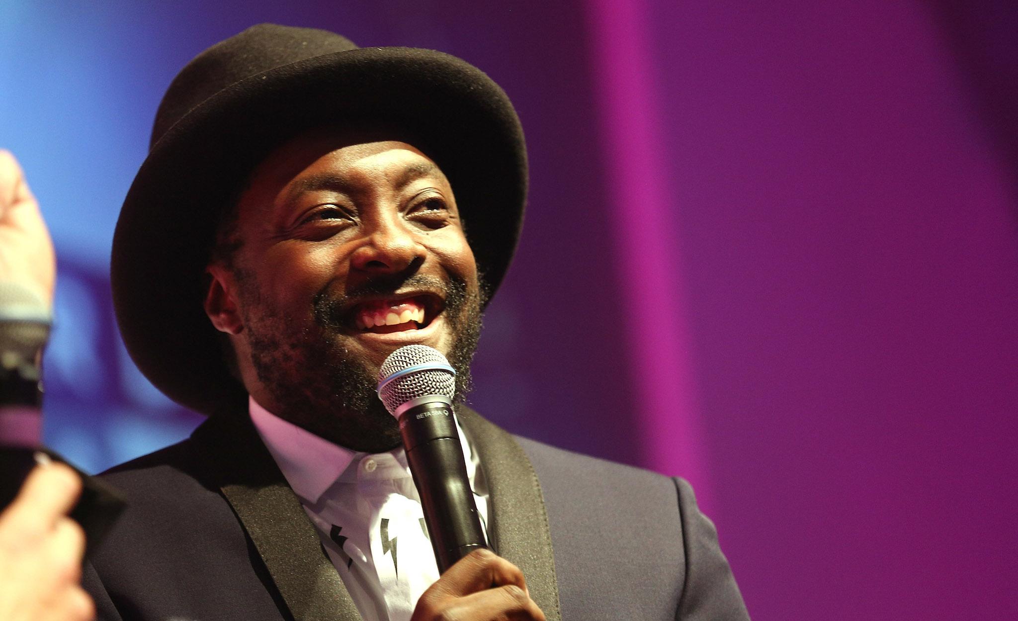 will.i.am takes part in an interview on stage as he wins the Tech Personality of the Year Award at the T3 Gadget Awards 2016
