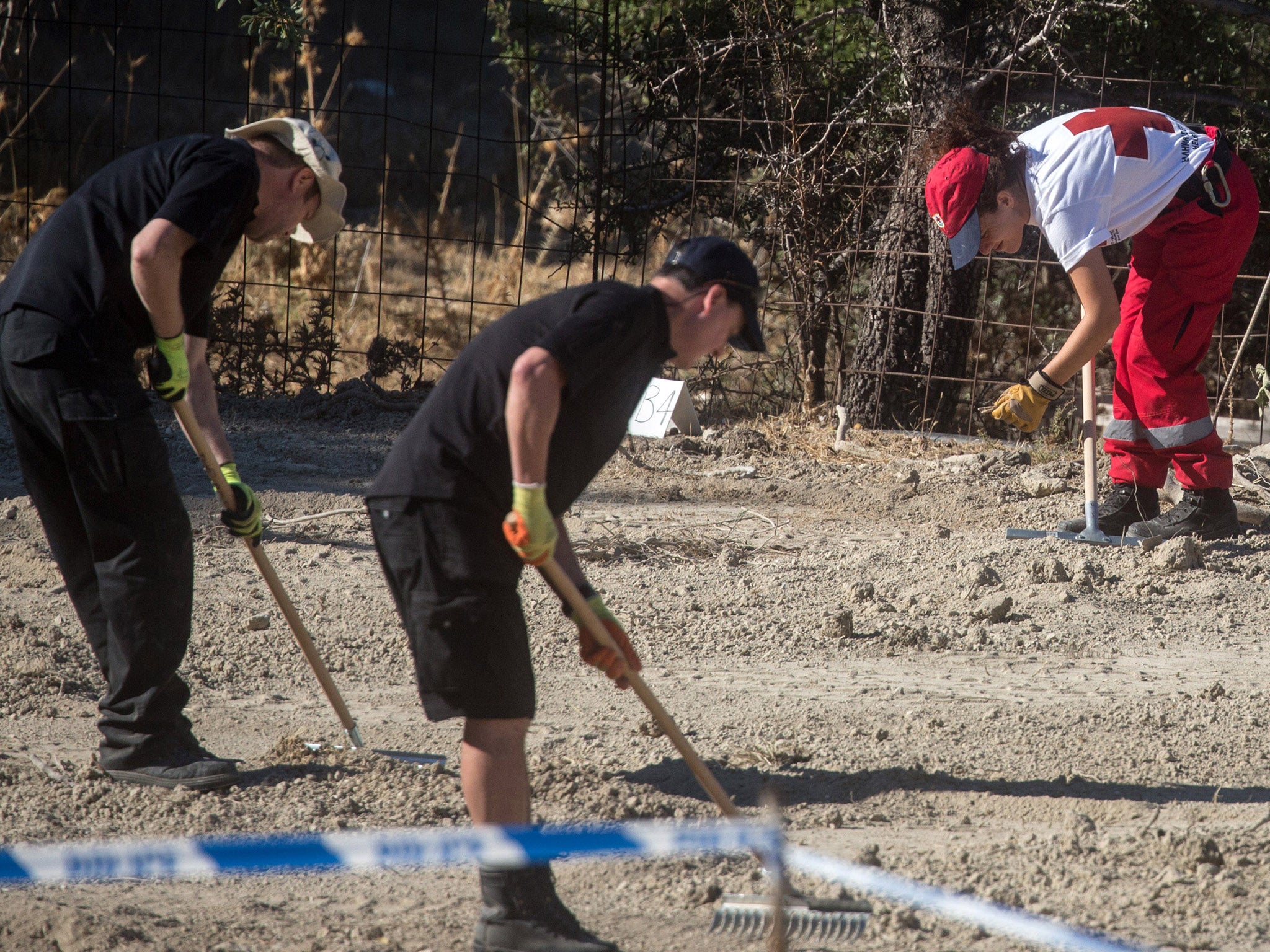 South Yorkshire Police and members of the Greek rescue service excavate a site in search of missing toddler Ben Needham