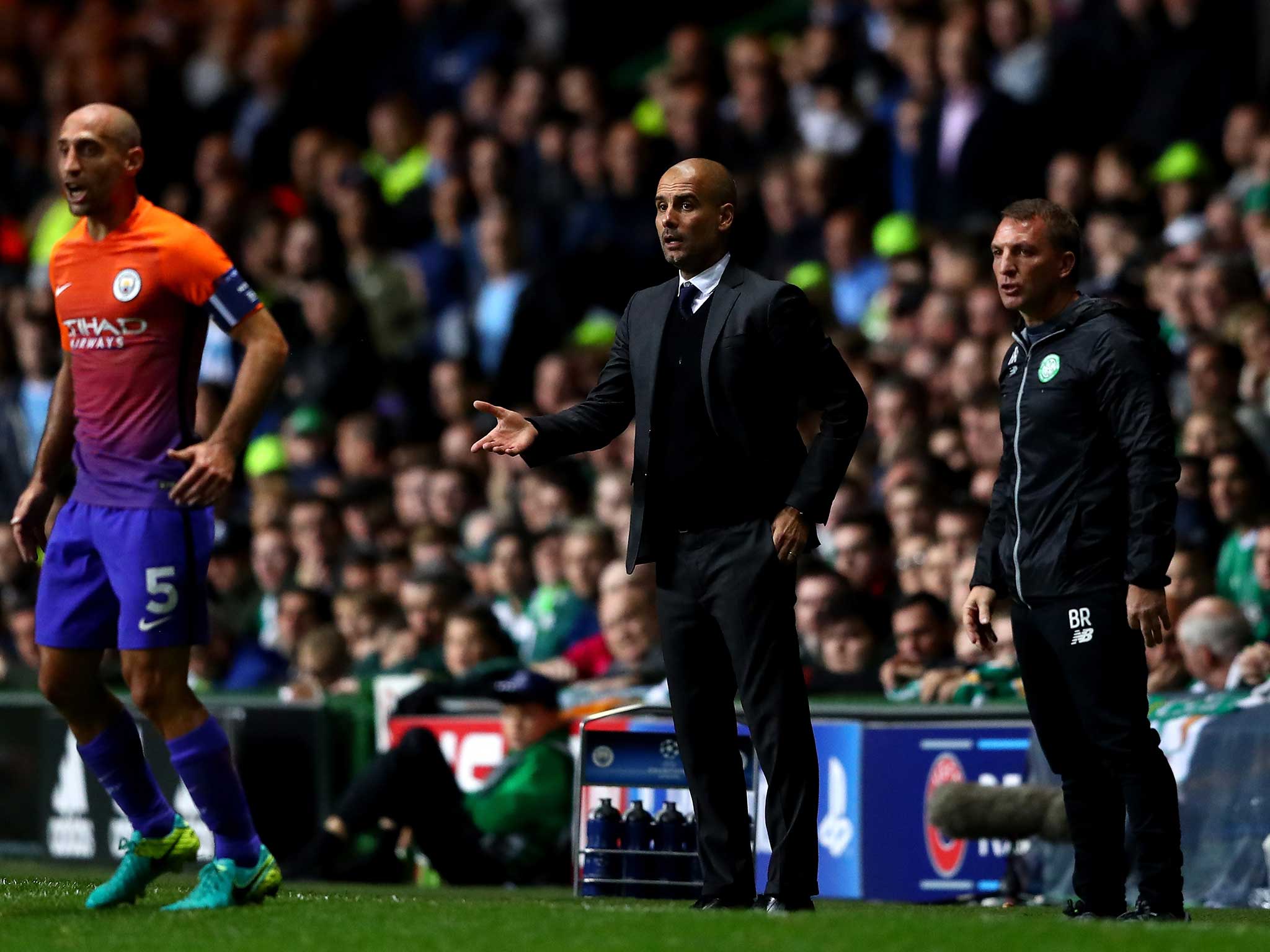 Pep Guardiola protests on the side-lines at Celtic Park