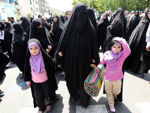 Wearing the Islamic headscarf is compulsory in public for all women in Iran 