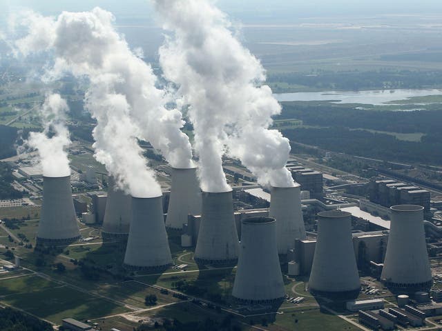 Steam rises from the Jaenschwalde coal-fired power plant in Germany