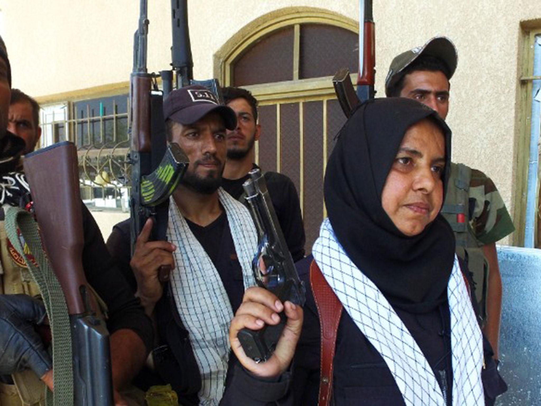 Um Hanadi recently led her militia in the battle to help government forces drive Isis from Shirqat