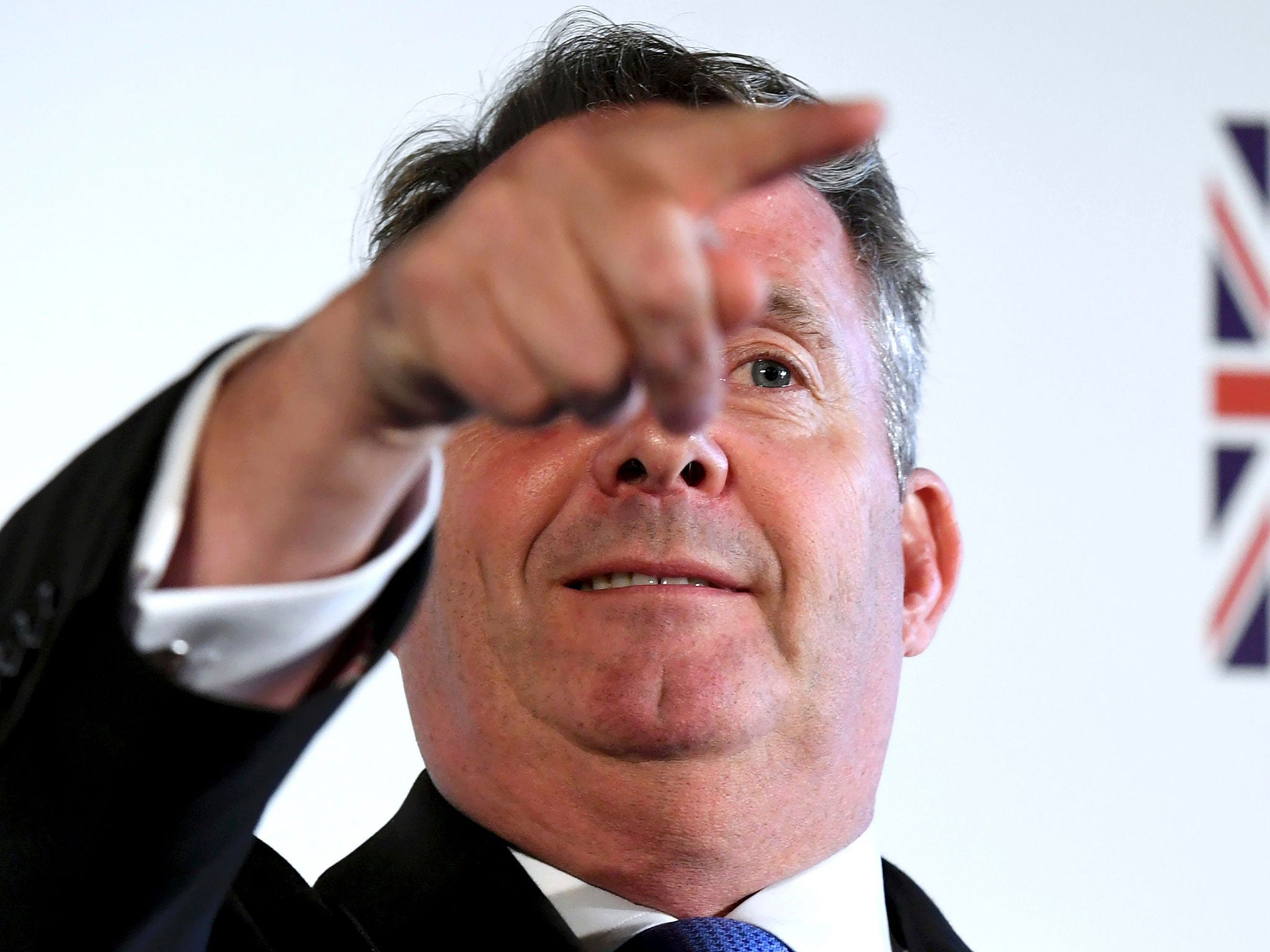 Liam Fox says a debate could not reasonable be scheduled before he signed the agreement