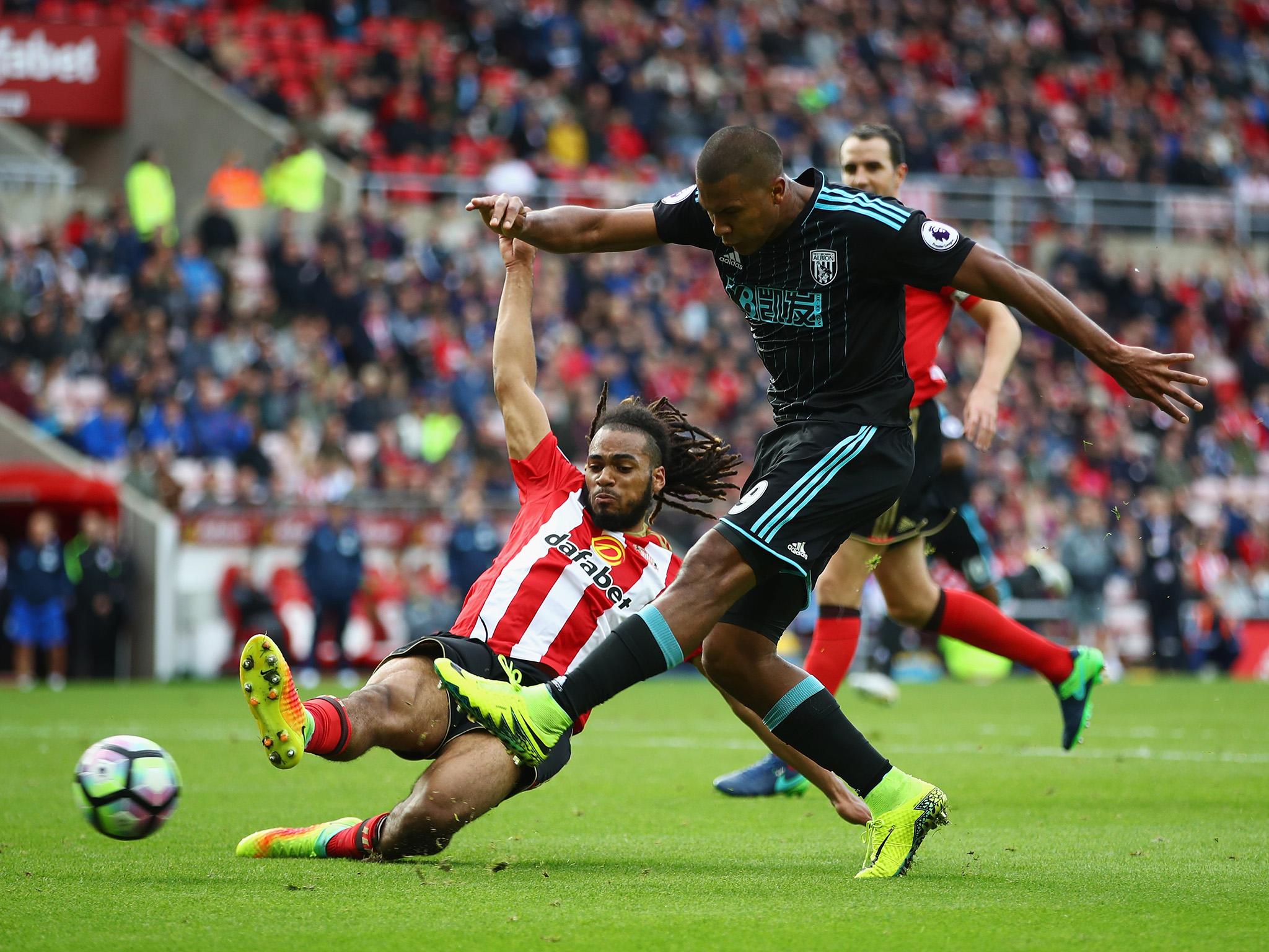 Salomon Rondon shoots under pressure from Jason Denayer (Getty)