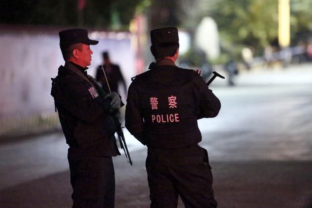 Police in Kunming, where Yang Qingpei was arrested