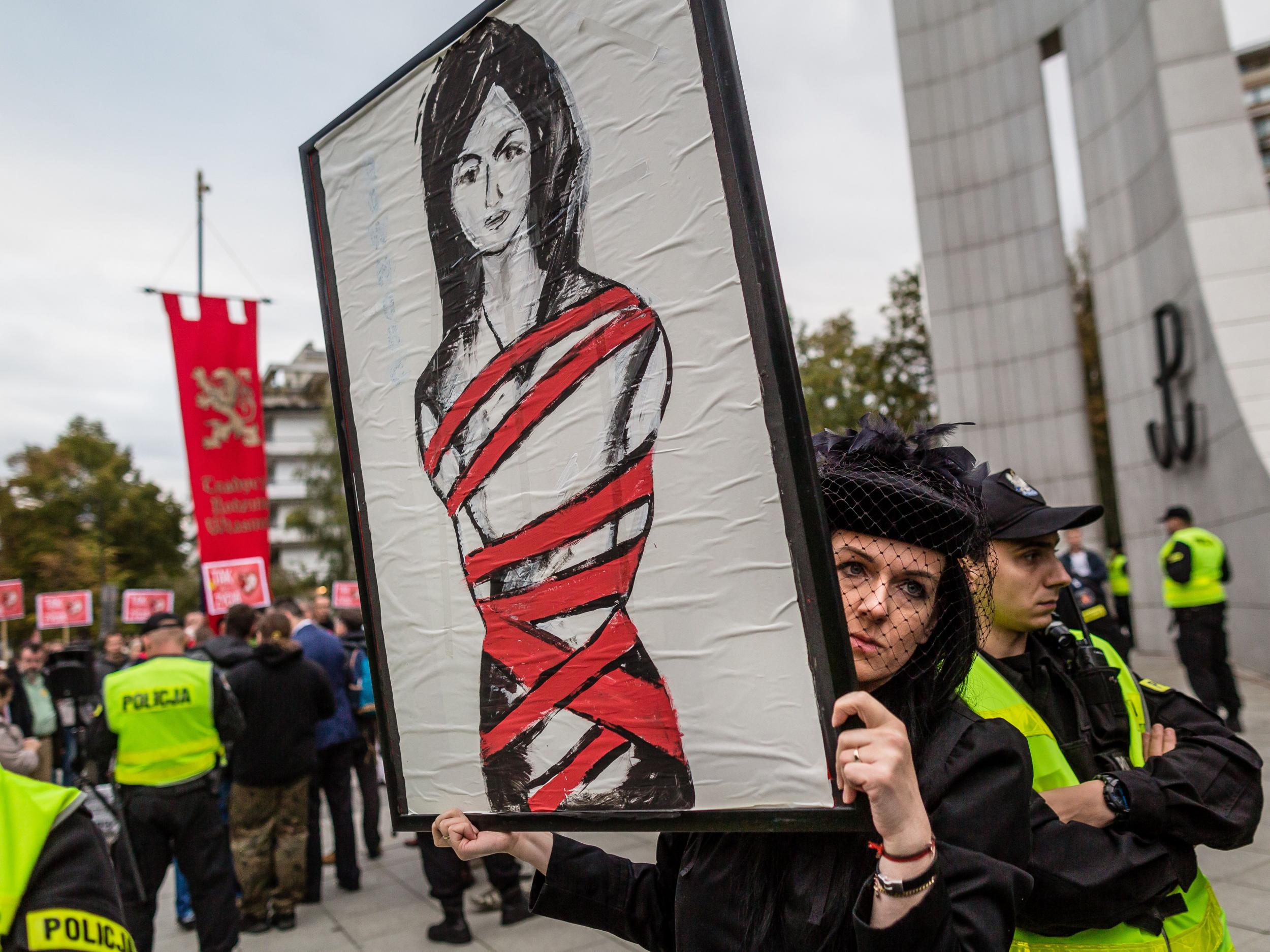 Demonstrators at a pro-choice protest in front of the Polish parliament in Warsaw