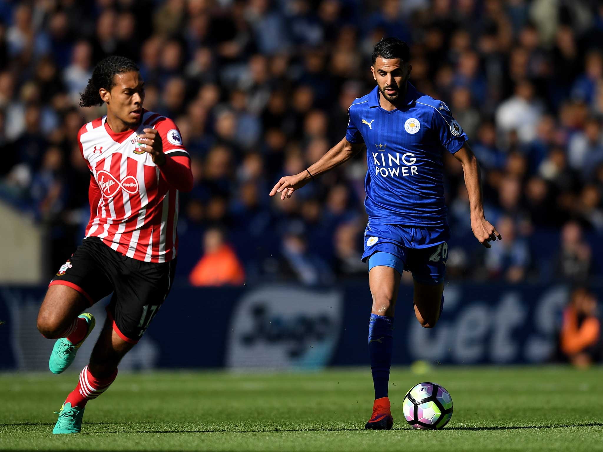 Riyad Mahrez makes an effort to break through the Saint's rearguard