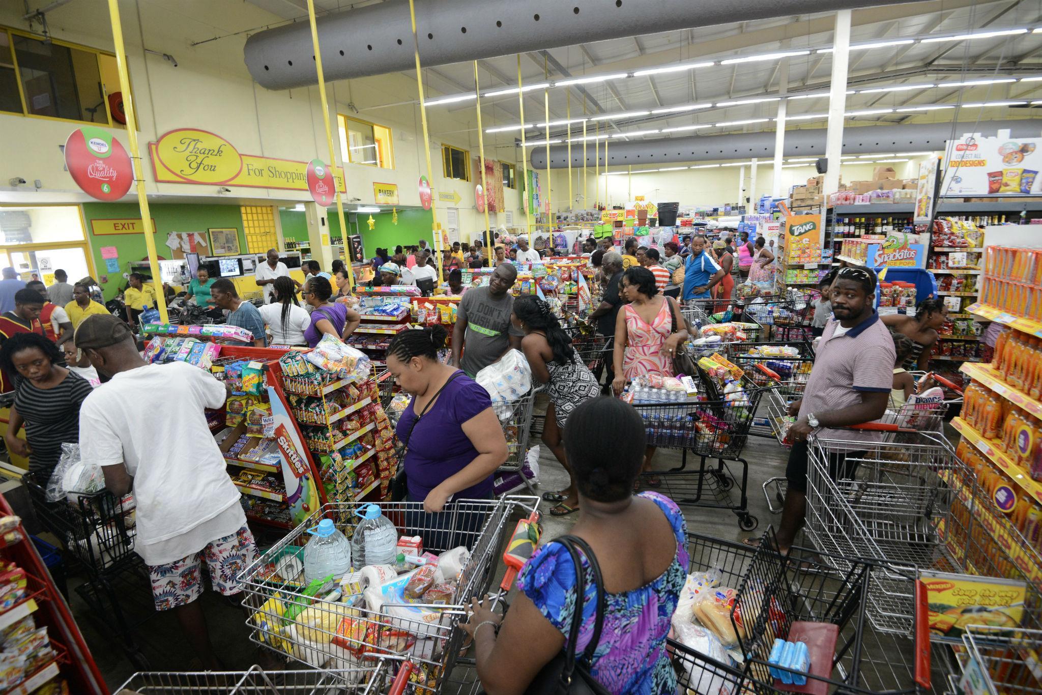 Shoppers in Jamaica stock up on emergency supplies ahead of Hurricane Matthew's arrival