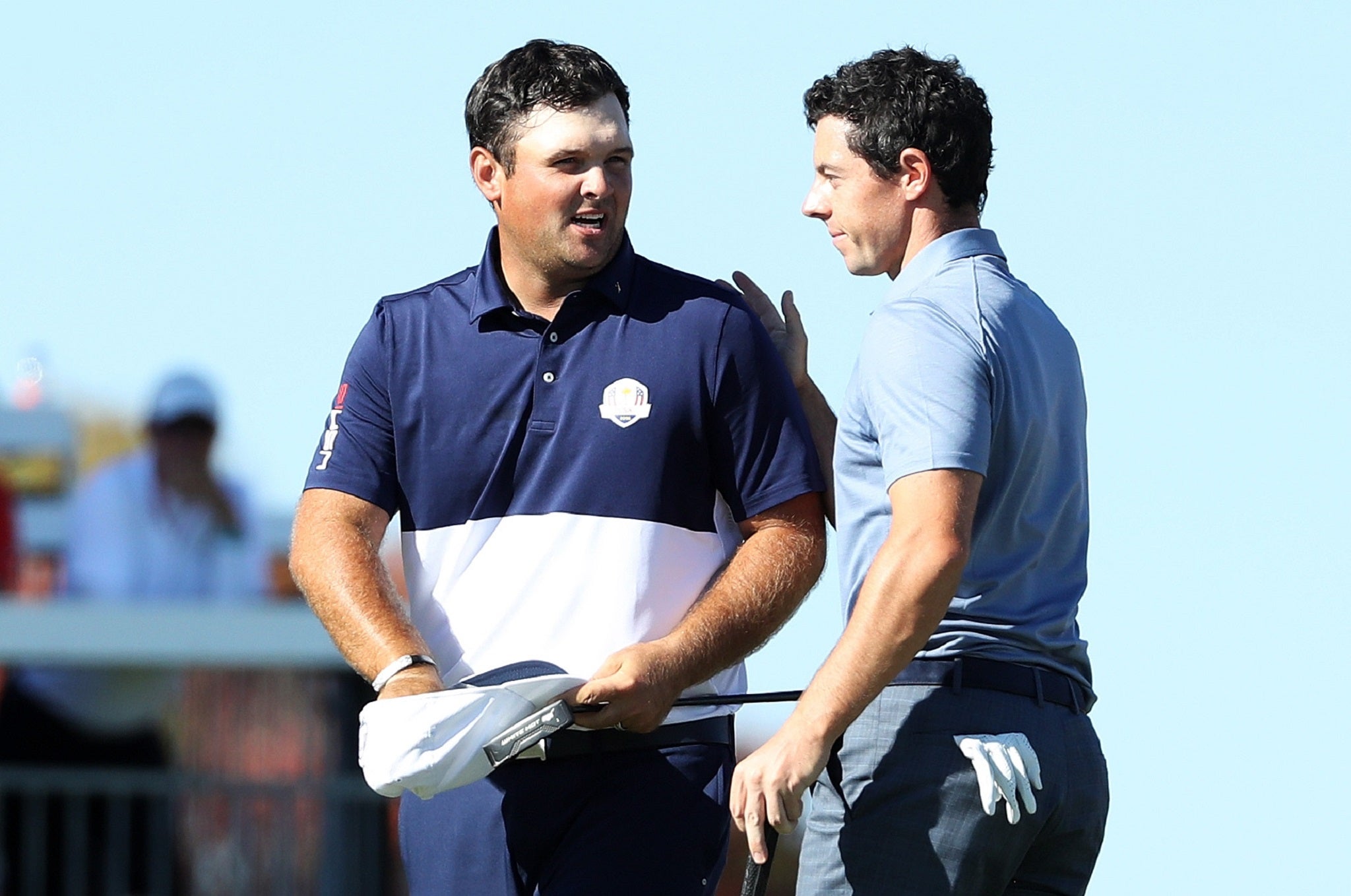 Rory McIlroy congratulates Patrick Reed on his singles victory on the final day of the Ryder Cup