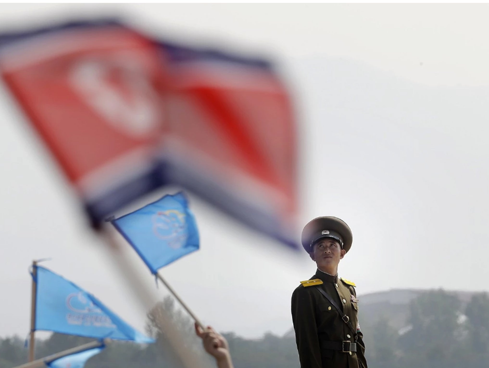 A North Korean military soldier stands guard on Sept. 24 during an air festival in Wonsan, North Korea