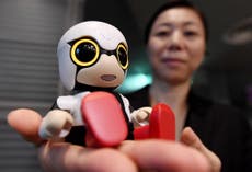 Toyota unveils robot baby intended to make lonely people happy