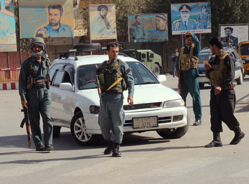 Afghan policeman on patrol in the city of Kunduz