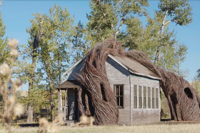 Daydreams, by Patrick Dougherty, sees a fake 19th-century schoolhouse overtaken by willow trees