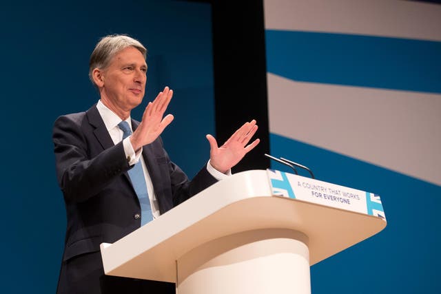 Chancellor Philip Hammond delivers his speech to Tory conference