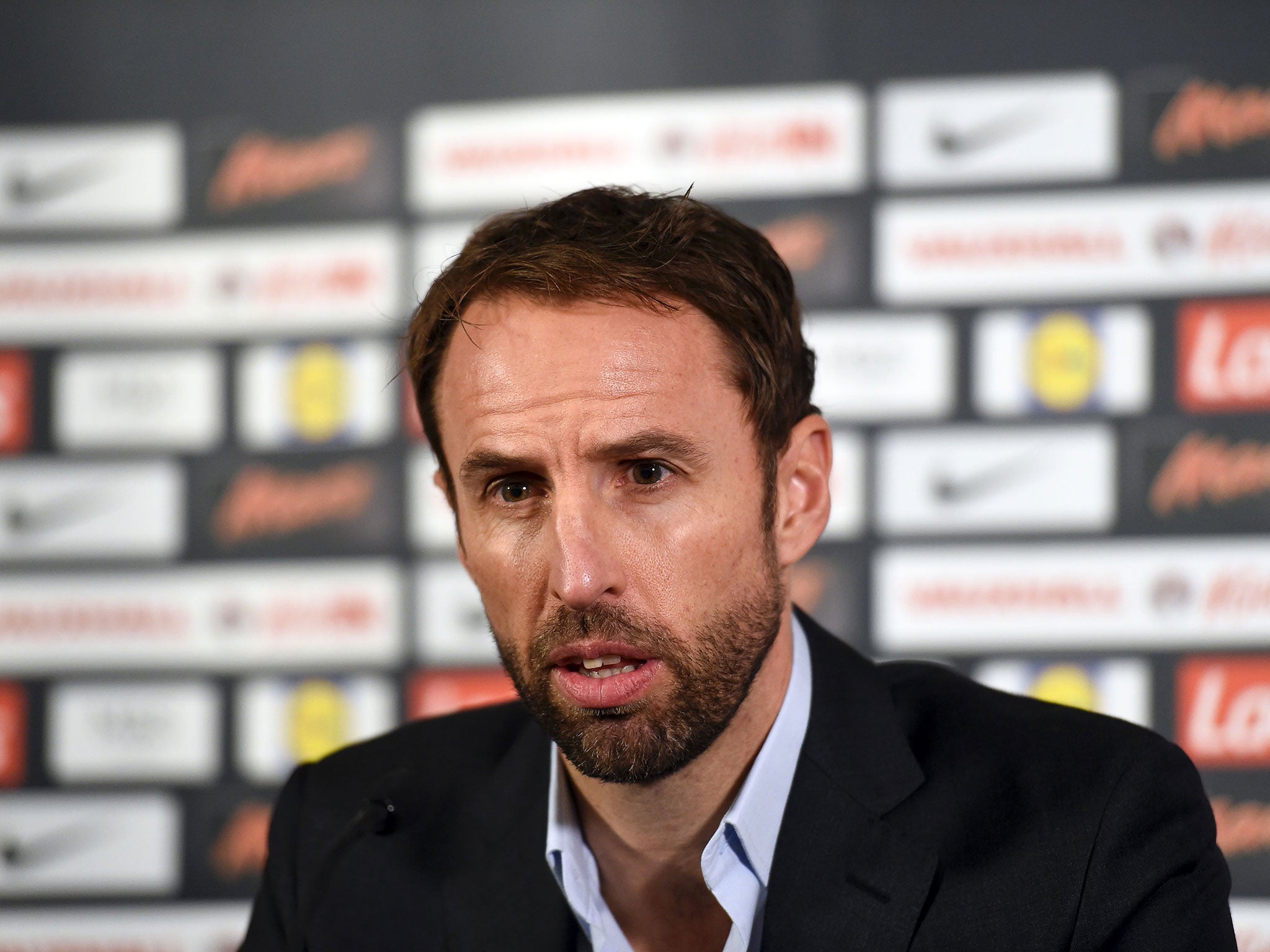 Gareth Southgate speaking at his first press conference as England manager