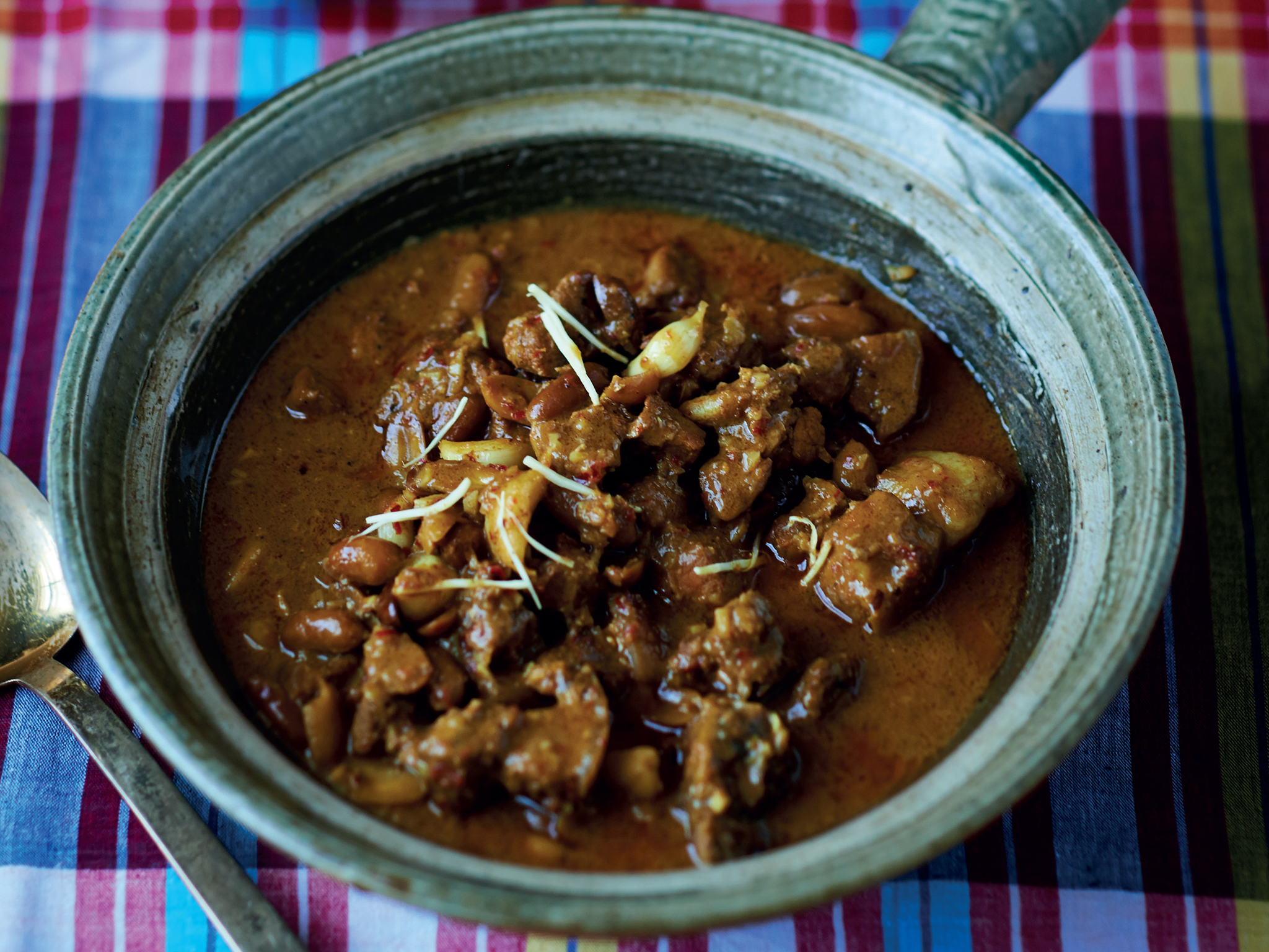 This pork curry uses two cuts of the meat and a Burmese masala powder to flavour