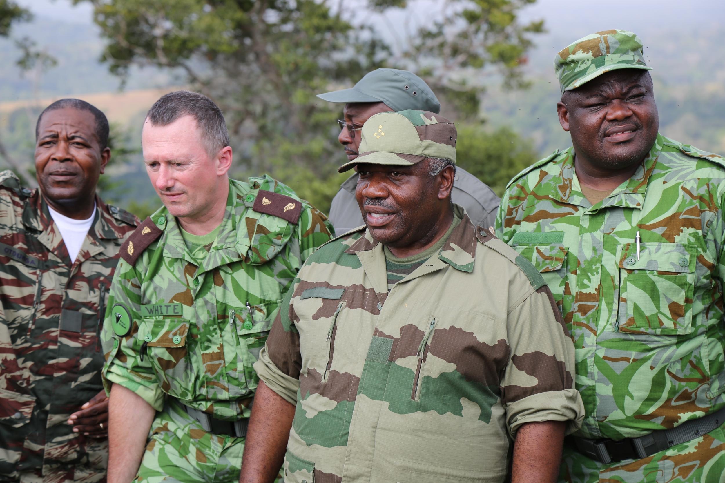 Professor Lee White in the field with Gabon's President Bongo Ondimba