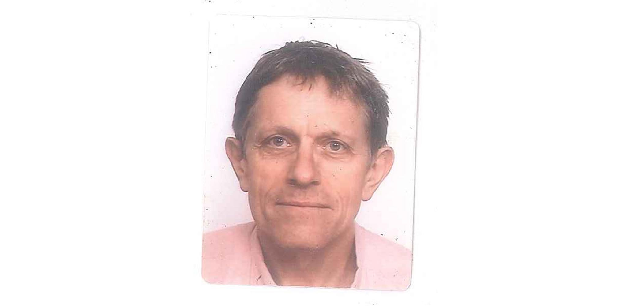 Simon Calder's stony-faced passport picture