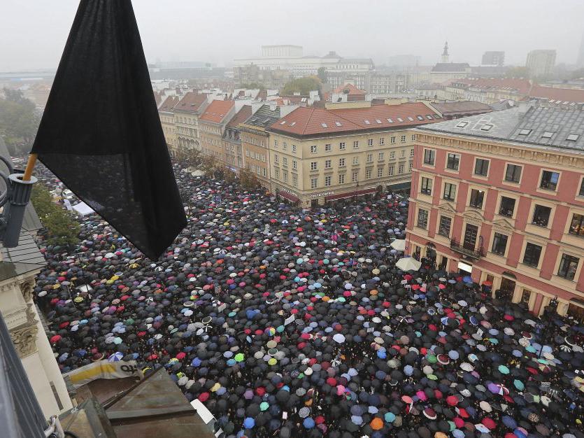 Thousands of umbrellas were visible during the nationwide strike on Monday