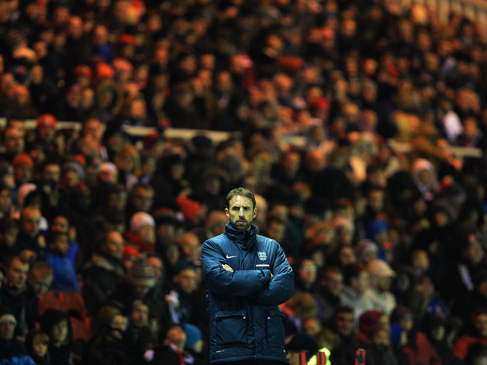 Southgate looks on from the sidelines during England U21's international friendly against Germany U21s last year