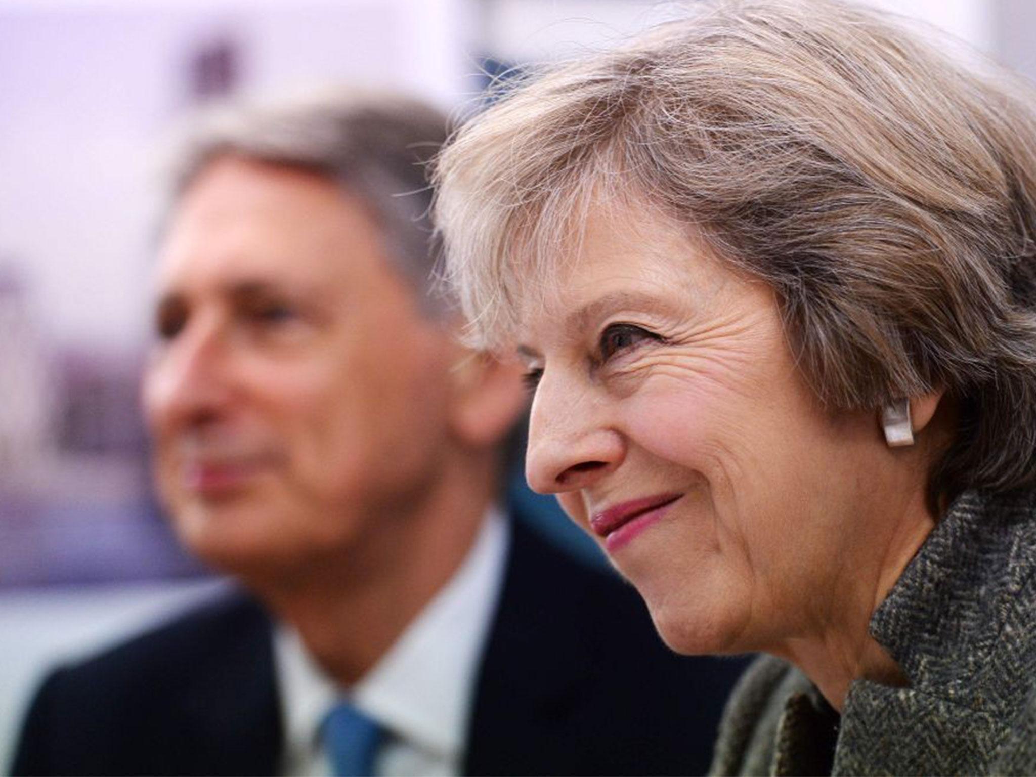 Hammond with Theresa May in Birmingham