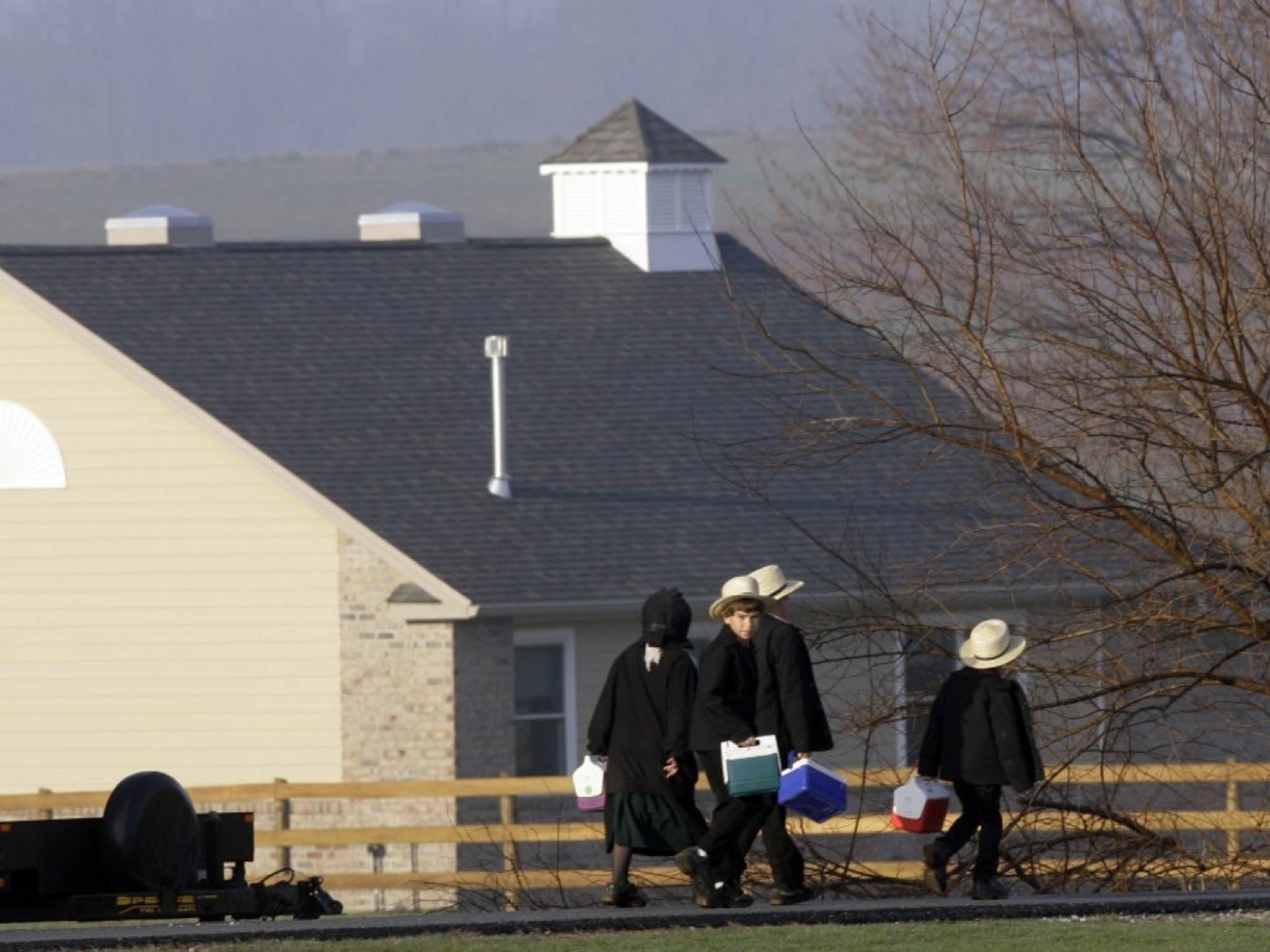 Amish children on their way to school in 2007. The building where the massacre took place was destroyed