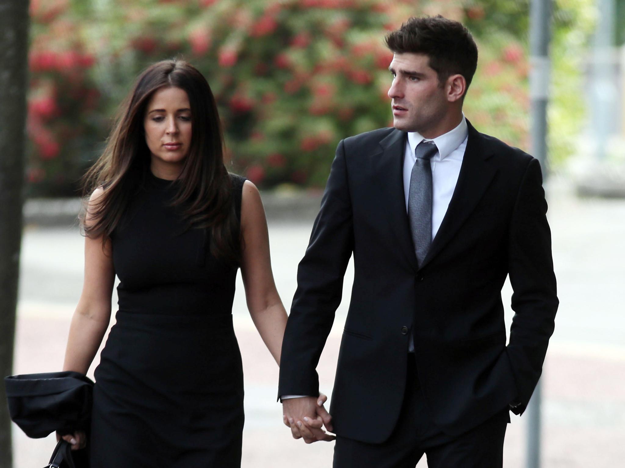 Footballer Ched Evans with partner Natasha Massey on their way into Cardiff Crown Court