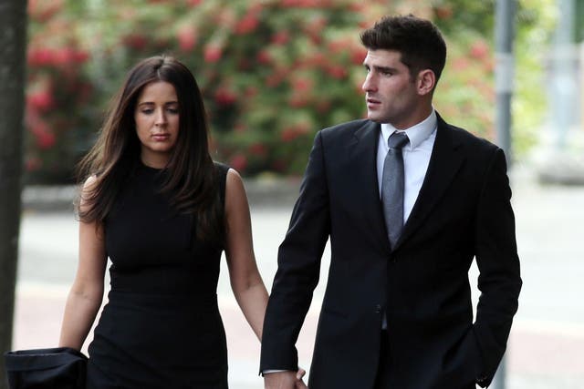 Footballer Ched Evans with partner Natasha Massey on their way into Cardiff Crown Court