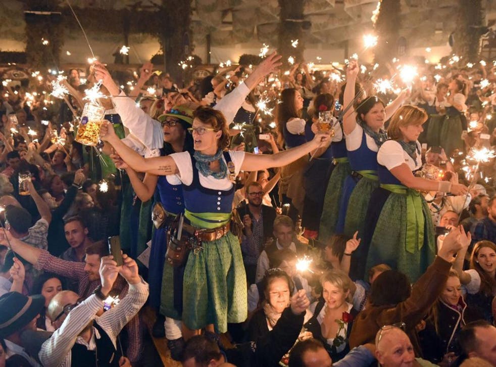 Festival staff in the Hofbraeu tent on the last day of the Oktoberfest beer festival in Munich, Germany, 3 October, 2016