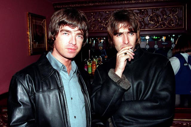 Noel and Liam Gallagher at the height of their fame in 1995